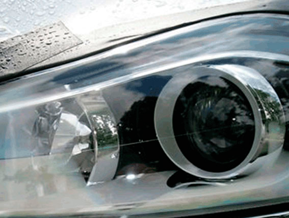 A close-up of the headlamp under investigation <br>The headlamp CAD and FEM models and a close-up of its internal flow under operating conditions